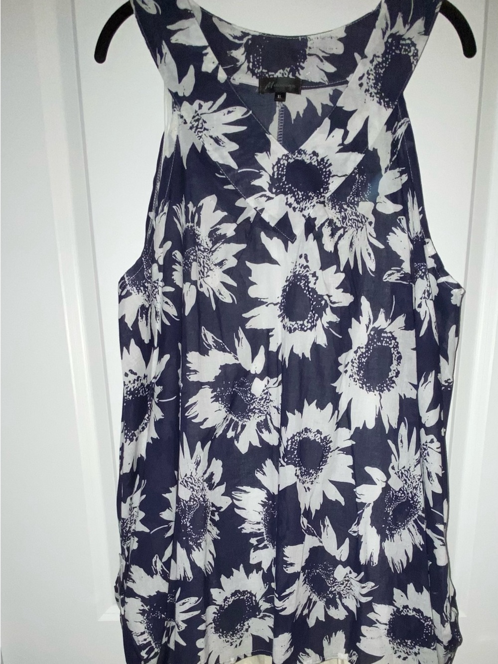 Woman’s Floral Print Navy and White Sleeveless flowing top